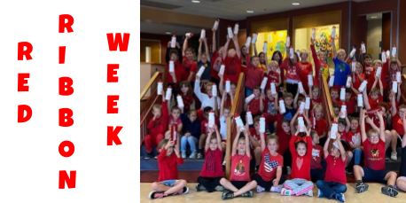 large group of elementary students wearing red shirts in honor of Red Ribbon Week 