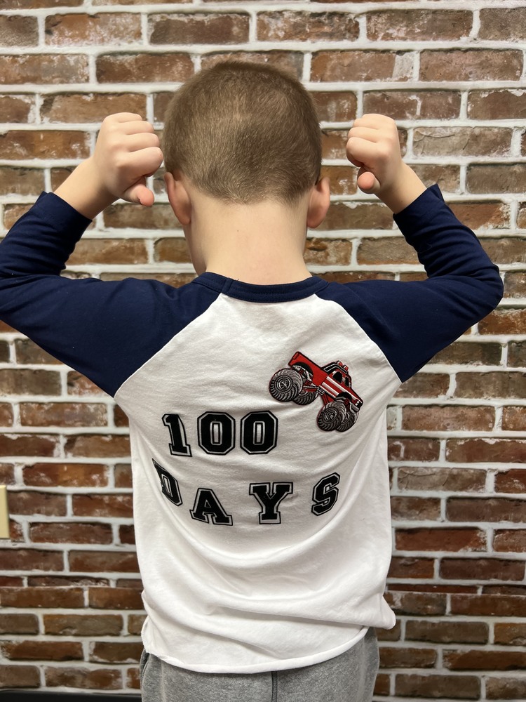 Student wearing 100 days of school t-shirt